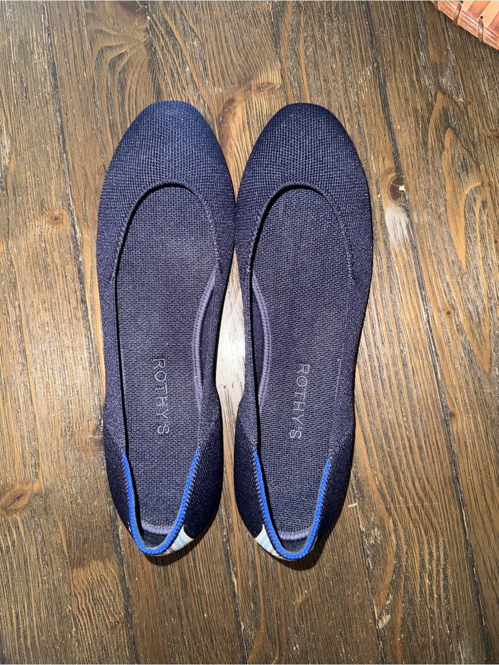 Rothy's Navy Knit Slip-Ons with Blue and Cream Heel Accents